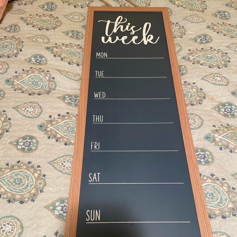 Weekly planner sign